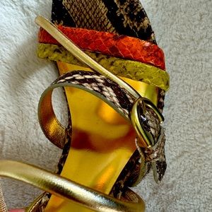 Coach high heel sandals with multi colored snake skin.